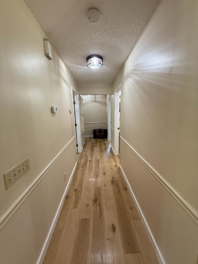 16051 Mo 142, Thayer, MO 65791 - hall with a textured ceiling and light wood-type flooring