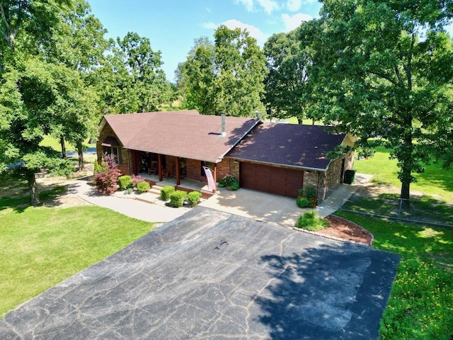16051 Mo 142, Thayer, MO 65791 - single story home featuring covered porch, driveway, an attached garage, and a front lawn