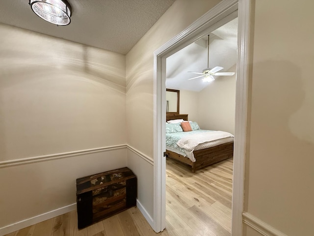 16051 Mo 142, Thayer, MO 65791 - hallway featuring wood finished floors and a textured ceiling