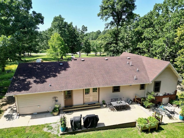 16051 Mo 142, Thayer, MO 65791 - back of house featuring french doors, a patio area, a shingled roof, and a lawn