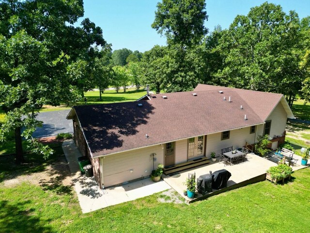 16051 Mo 142, Thayer, MO 65791 - back of property featuring a patio, a yard, and roof with shingles