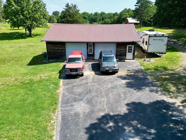 16051 Mo 142, Thayer, MO 65791 - view of front of property featuring a garage, a front lawn, and a metal roof