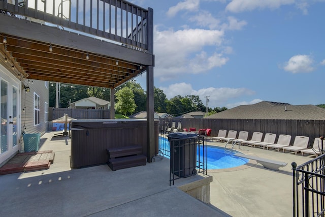 440 Spring Meadow Pkwy, Branson, MO 65616 - view of swimming pool with a hot tub, a patio, and a fenced backyard
