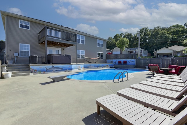 440 Spring Meadow Pkwy, Branson, MO 65616 - view of swimming pool with a hot tub, a fenced backyard, and a patio