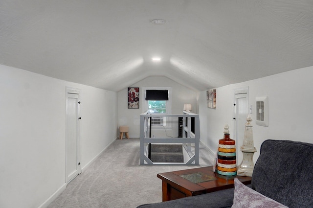 1841 E Dale St, Springfield, MO 65803 - carpeted living room featuring vaulted ceiling and baseboards