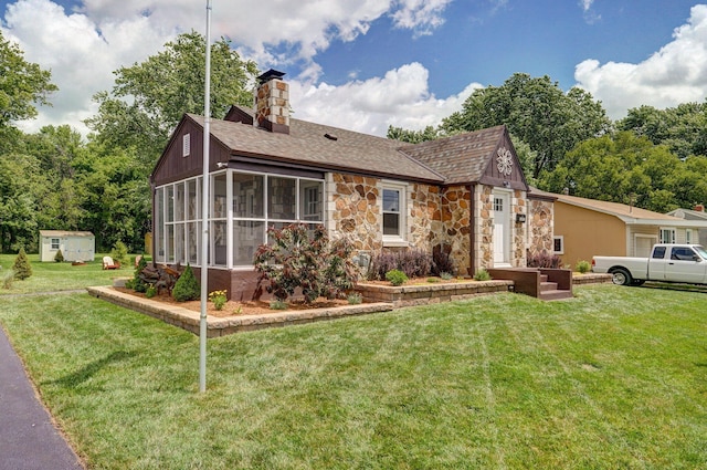 1841 E Dale St, Springfield, MO 65803 - view of front of property with roof with shingles, stone siding, a front lawn, and a chimney