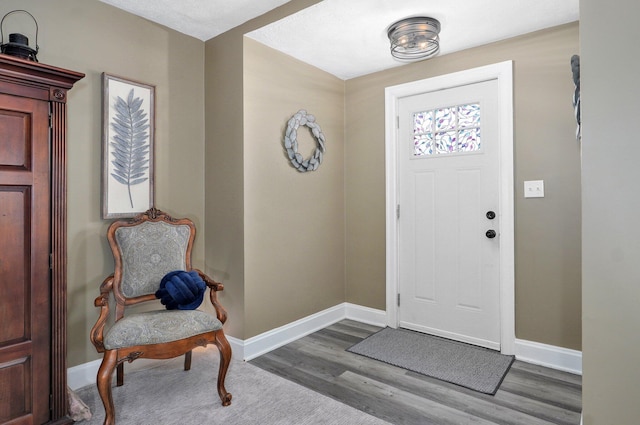 1841 E Dale St, Springfield, MO 65803 - foyer entrance featuring baseboards and wood finished floors