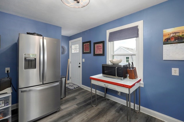1841 E Dale St, Springfield, MO 65803 - kitchen with appliances with stainless steel finishes and dark wood-style floors