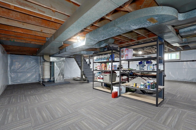 1841 E Dale St, Springfield, MO 65803 - basement with carpet flooring and stairway