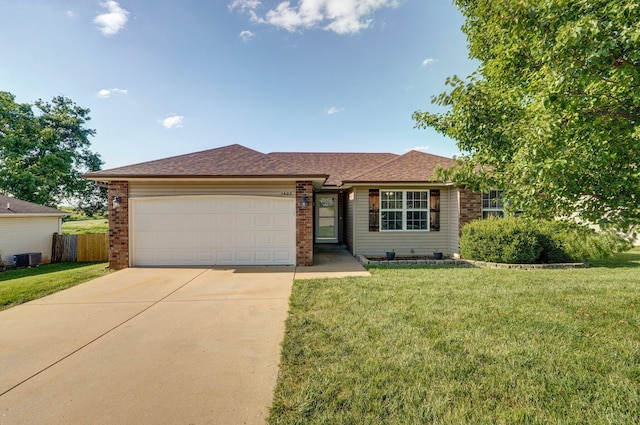 1603 W Robin St, Ozark, MO 65721 - ranch-style house with brick siding, an attached garage, driveway, and a shingled roof