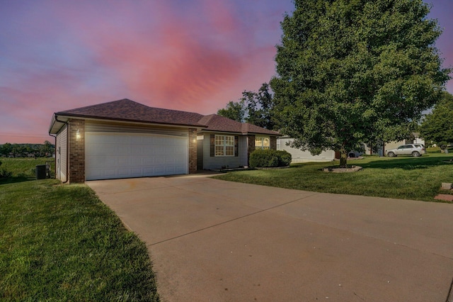 1603 W Robin St, Ozark, MO 65721 - ranch-style home with brick siding, a garage, a front yard, and driveway