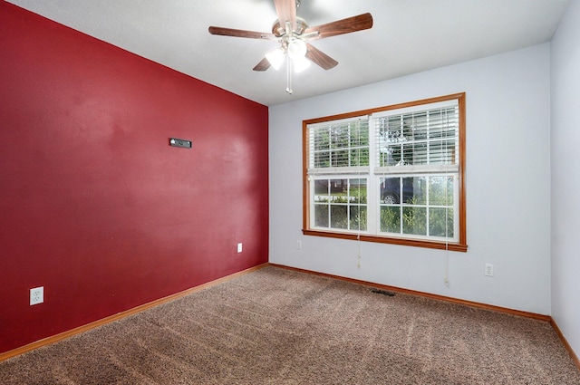 1603 W Robin St, Ozark, MO 65721 - carpeted spare room with ceiling fan and baseboards