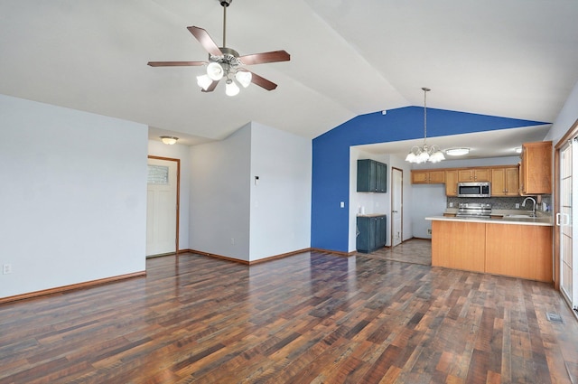 1603 W Robin St, Ozark, MO 65721 - unfurnished living room with a chandelier, vaulted ceiling, dark wood finished floors, and ceiling fan