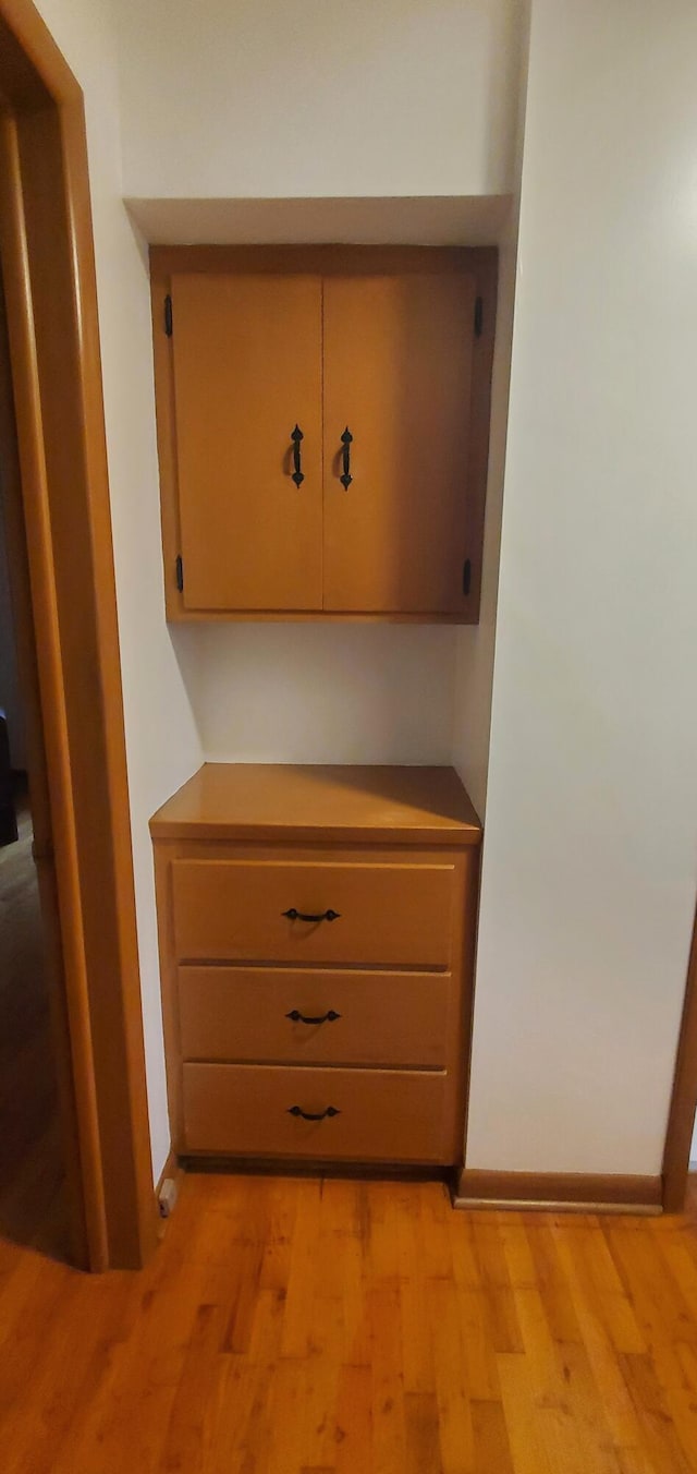 918 E Mcgee St, Springfield, MO 65807 - detailed view of wood finished floors and baseboards