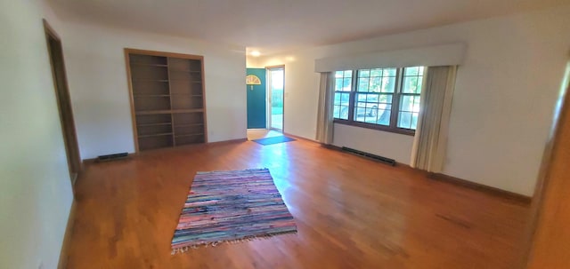 918 E Mcgee St, Springfield, MO 65807 - empty room featuring wood finished floors