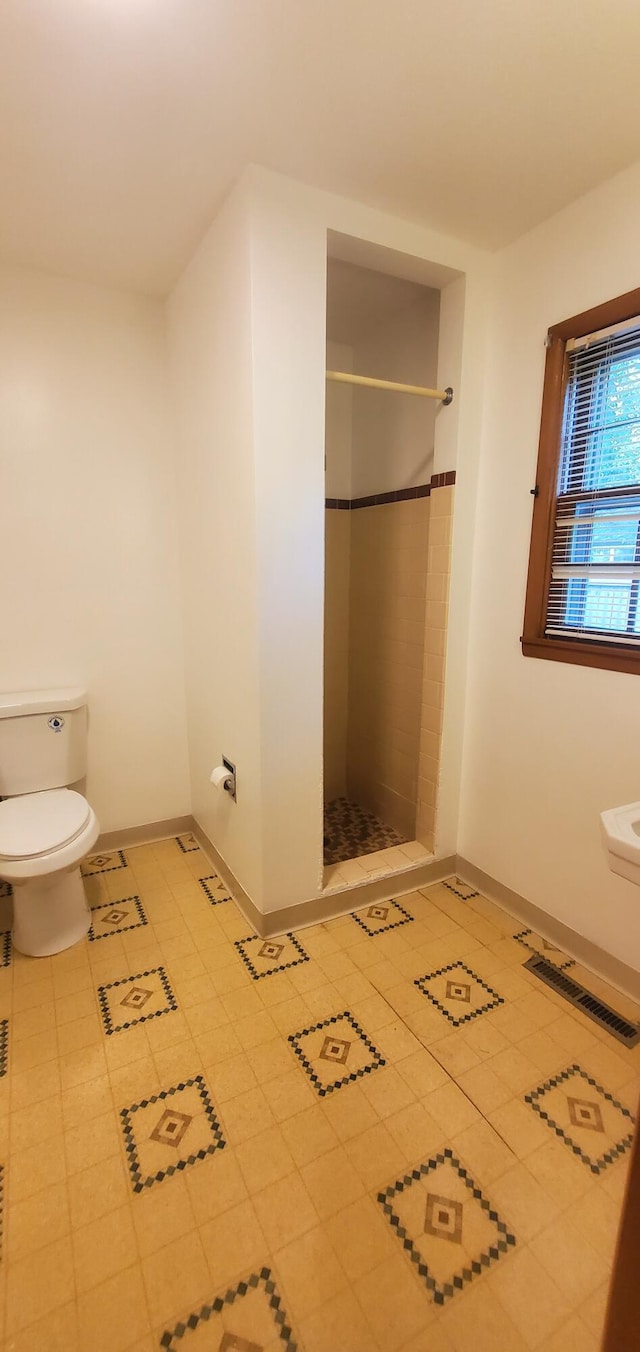918 E Mcgee St, Springfield, MO 65807 - bathroom with toilet and a stall shower