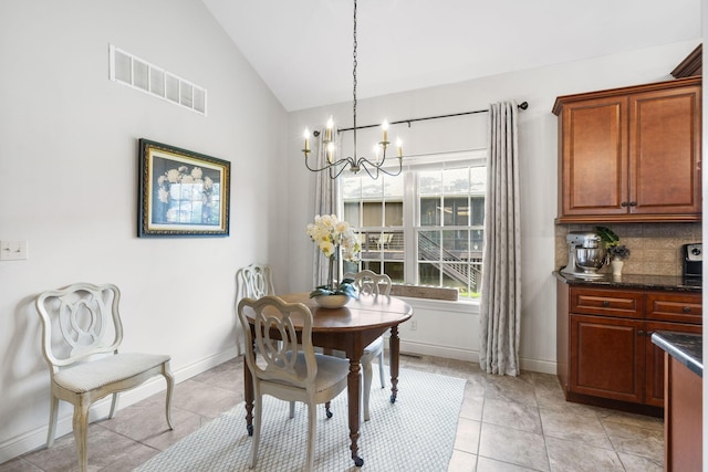 253 Cedar Glade Dr, Branson West, MO 65737 - dining room featuring a chandelier, lofted ceiling, and light tile patterned floors
