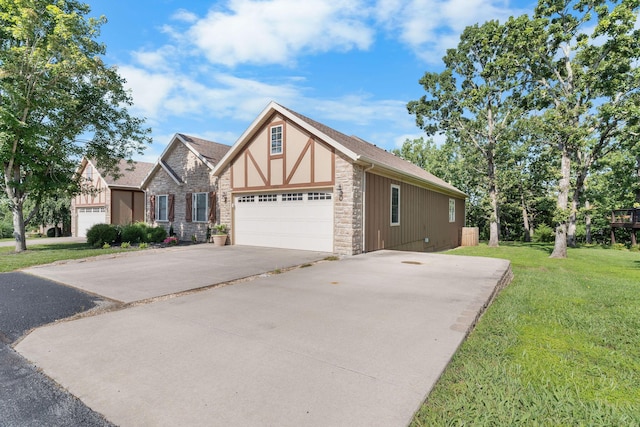 253 Cedar Glade Dr, Branson West, MO 65737 - tudor house with concrete driveway, a front lawn, stone siding, and roof with shingles