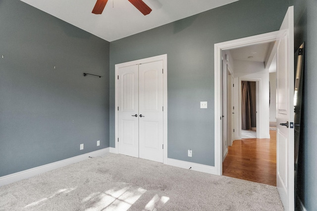 253 Cedar Glade Dr, Branson West, MO 65737 - unfurnished bedroom featuring carpet, a closet, and a ceiling fan