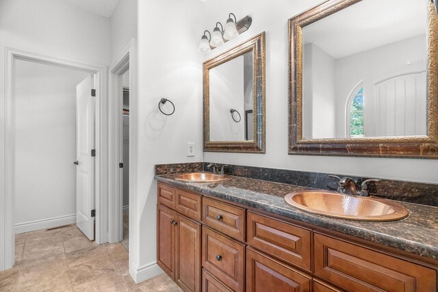 253 Cedar Glade Dr, Branson West, MO 65737 - full bath with double vanity and baseboards