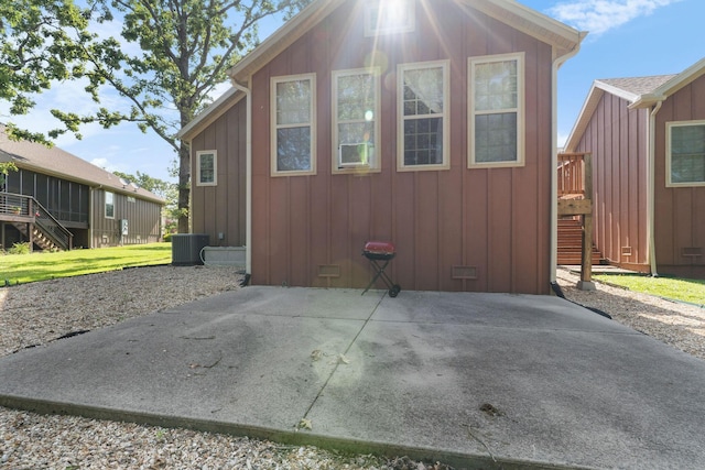 253 Cedar Glade Dr, Branson West, MO 65737 - view of side of home with stairs and a central AC unit