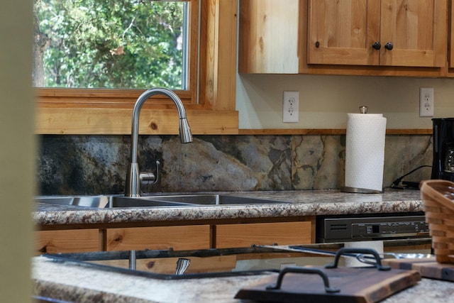 26474 Kings River Rd, Shell Knob, MO 65747 - kitchen view of backsplash and brown cabinetry
