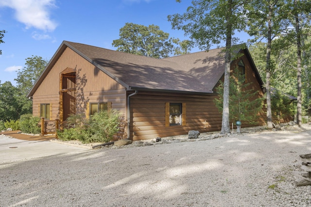 26474 Kings River Rd, Shell Knob, MO 65747 - view of side of property with a shingled roof