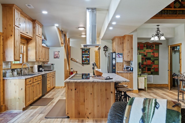 26474 Kings River Rd, Shell Knob, MO 65747 - kitchen with extractor fan, light wood finished floors, a center island, stainless steel appliances, and recessed lighting