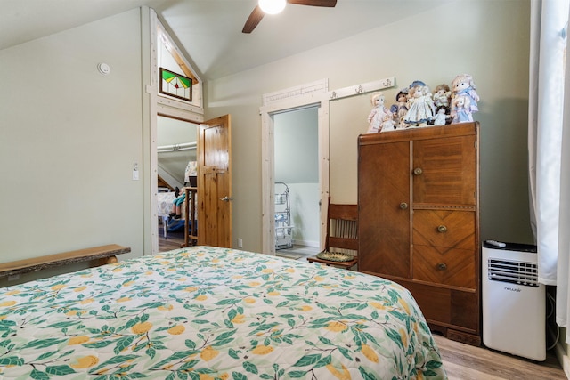 26474 Kings River Rd, Shell Knob, MO 65747 - bedroom featuring vaulted ceiling, light wood-type flooring, ceiling fan, and a closet