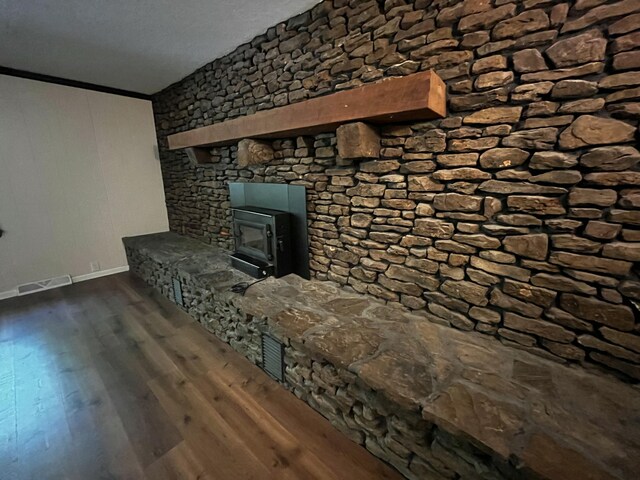 805 E 13th St, Cassville, MO 65625 - unfurnished living room with baseboards and dark wood-style floors
