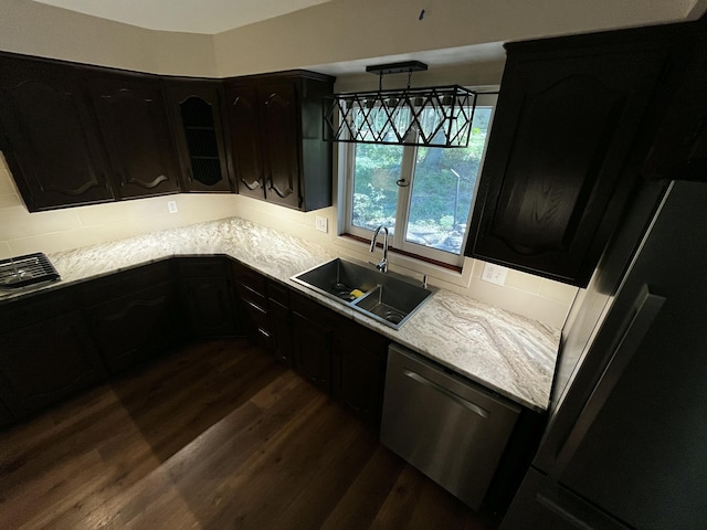 805 E 13th St, Cassville, MO 65625 - kitchen featuring fridge, dishwasher, dark wood-type flooring, and dark cabinets