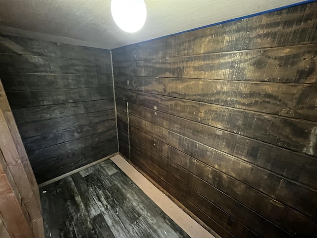 805 E 13th St, Cassville, MO 65625 - empty room featuring wood finished floors, wood walls, and a sauna / steam room