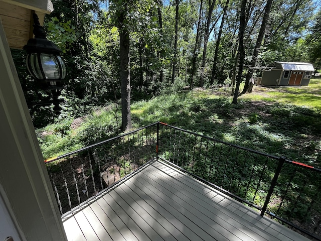 805 E 13th St, Cassville, MO 65625 - wooden deck featuring a shed
