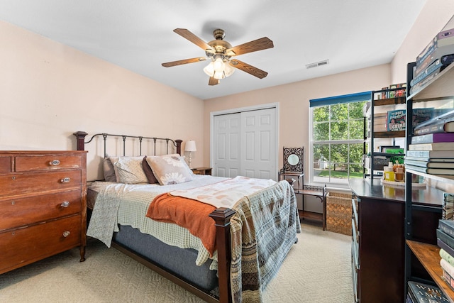 295 Deer Run Rd, Branson, MO 65616 - bedroom with a closet, light colored carpet, and ceiling fan