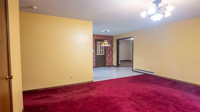 619 9th St, Thayer, MO 65791 - carpeted spare room with a baseboard heating unit, a smoke detector, and a chandelier
