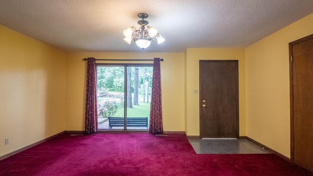 619 9th St, Thayer, MO 65791 - spare room with carpet flooring, a chandelier, and a textured ceiling