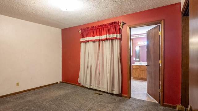619 9th St, Thayer, MO 65791 - unfurnished room with carpet and a textured ceiling