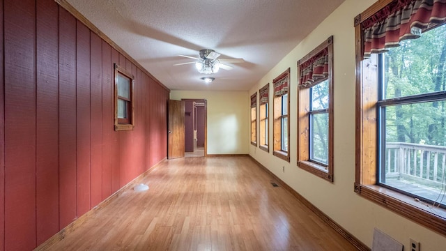 619 9th St, Thayer, MO 65791 - hall with light wood-type flooring and a textured ceiling