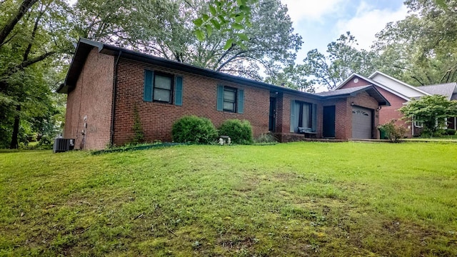 619 9th St, Thayer, MO 65791 - single story home with brick siding, an attached garage, and a front yard