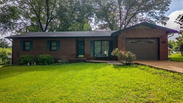 619 9th St, Thayer, MO 65791 - ranch-style home featuring brick siding, an attached garage, driveway, and a front yard
