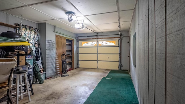 619 9th St, Thayer, MO 65791 - garage featuring a garage door opener