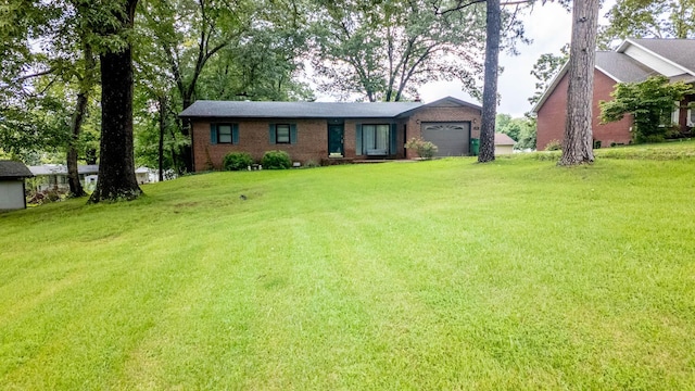 619 9th St, Thayer, MO 65791 - single story home with an attached garage, a front yard, and brick siding