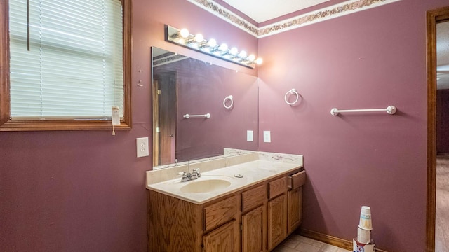 619 9th St, Thayer, MO 65791 - bathroom with vanity and baseboards