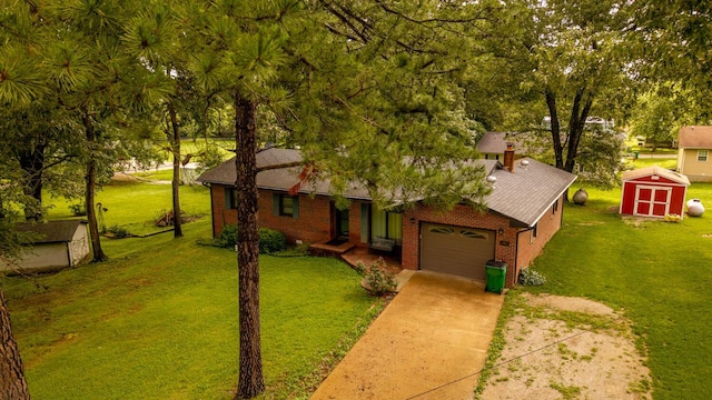 619 9th St, Thayer, MO 65791 - view of front of property with a storage shed, a garage, brick siding, driveway, and a front yard