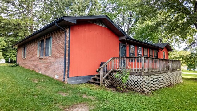 619 9th St, Thayer, MO 65791 - view of side of home featuring a lawn, crawl space, and a deck