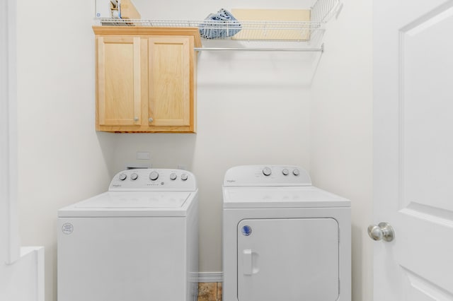 3790 W Rockwood St, Springfield, MO 65807 - laundry area featuring washing machine and dryer and cabinet space