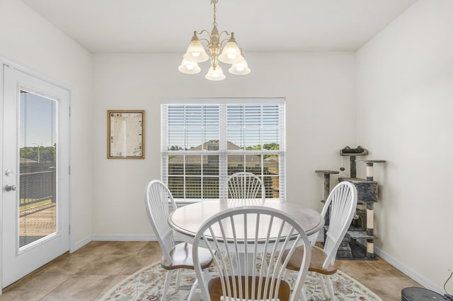3790 W Rockwood St, Springfield, MO 65807 - dining space with a chandelier and light tile patterned floors