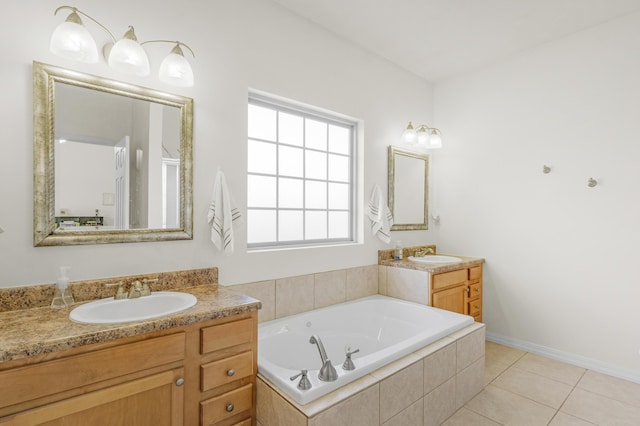 3790 W Rockwood St, Springfield, MO 65807 - bathroom featuring two vanities, a garden tub, and tile patterned flooring