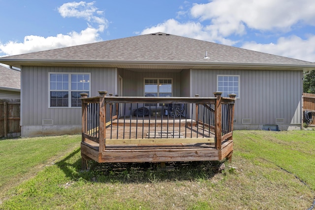 3790 W Rockwood St, Springfield, MO 65807 - rear view of property featuring a yard, a deck, and a shingled roof