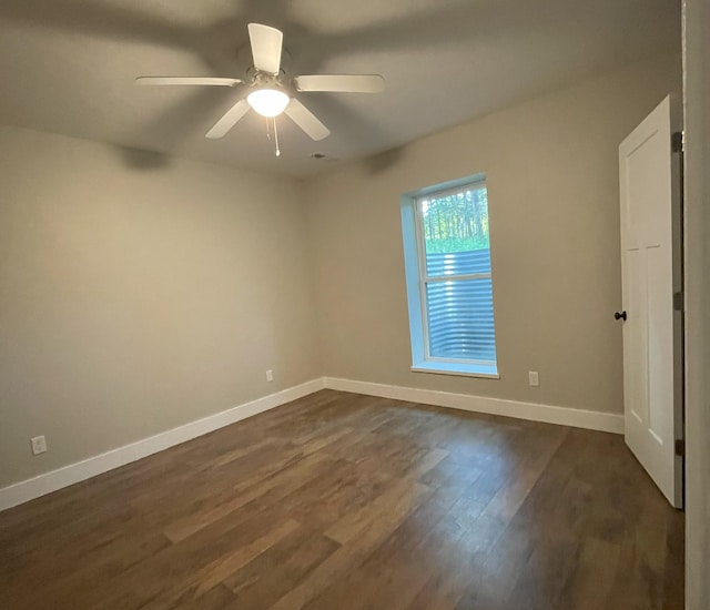 24136 Lazy Daze Ln, Wheatland, MO 65779 - unfurnished room featuring ceiling fan and dark wood-style floors